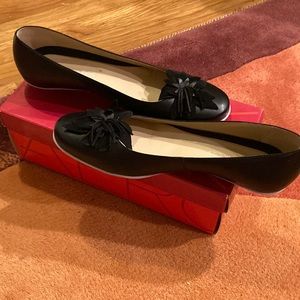 Women’s Black Leather Shoes with Floral Touch